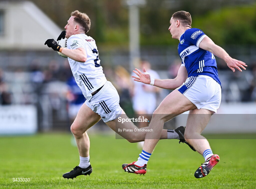 19 April 2026; Brian Byrne of Kildare in action against Evan O'Carroll of Laois during the Leinster GAA Football Senior Championship quarter-final match between Kildare and Laois at Cedral St Conleths Park in Newbridge, Kildare. Photo by Piaras Ó Mídheach/Sportsfile