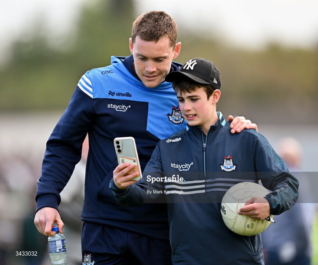 19 April 2026; Con O'Callaghan of Dublin poses for a photo with a supporter after the Leinster GAA Football Senior Championship quarter-final match between Wicklow and Dublin at Echelon Park in Aughrim in Wicklow. Photo by Mark Kavanagh/Sportsfile