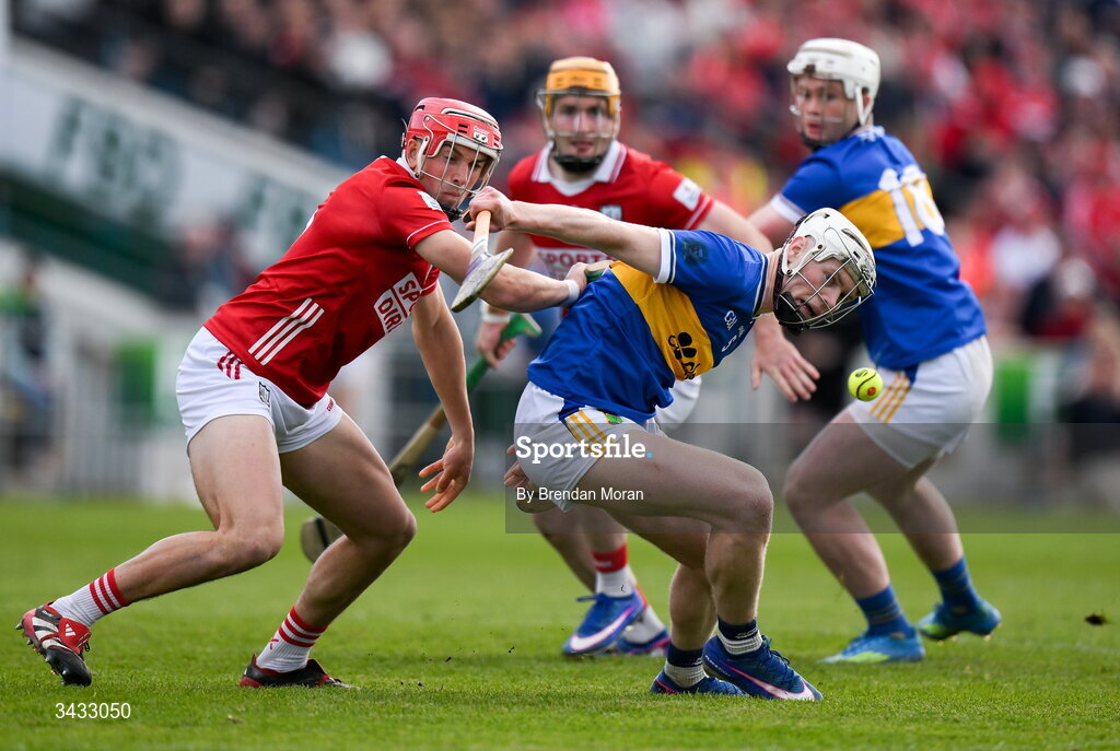 19 April 2026; Oisin O'Donoghue of Tipperary and Ciarán Joyce of Cork contest a loose sliotar during the Munster GAA Senior Hurling Championship Round 1 match between Tipperary and Cork at FBD Semple Stadium in Thurles, Tipperary. Photo by Brendan Moran/Sportsfile