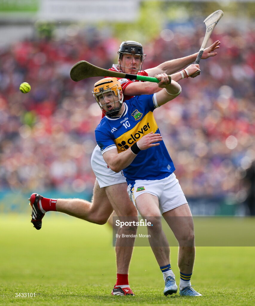19 April 2026; Jake Morris of Tipperary and Eoin Downey of Cork contest a dropping ball during the Munster GAA Senior Hurling Championship Round 1 match between Tipperary and Cork at FBD Semple Stadium in Thurles, Tipperary. Photo by Brendan Moran/Sportsfile