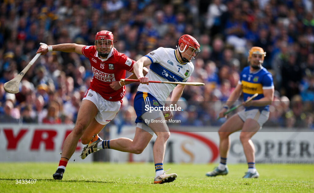 19 April 2026; Tipperary goalkeeper Rhys Shelly is tackled by Brian Hayes of Cork during the Munster GAA Senior Hurling Championship Round 1 match between Tipperary and Cork at FBD Semple Stadium in Thurles, Tipperary. Photo by Brendan Moran/Sportsfile