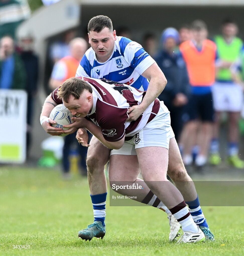 19 April 2026; Brian Kehoe of Tullow RFC is tackled by Matthew Henry of Athy RFC during the Bank of Ireland Provincial Towns Cup Final match between Athy RFC and Tullow RFC at Edenderry RFC in Edenderry, Offaly. Photo by Matt Browne/Sportsfile
