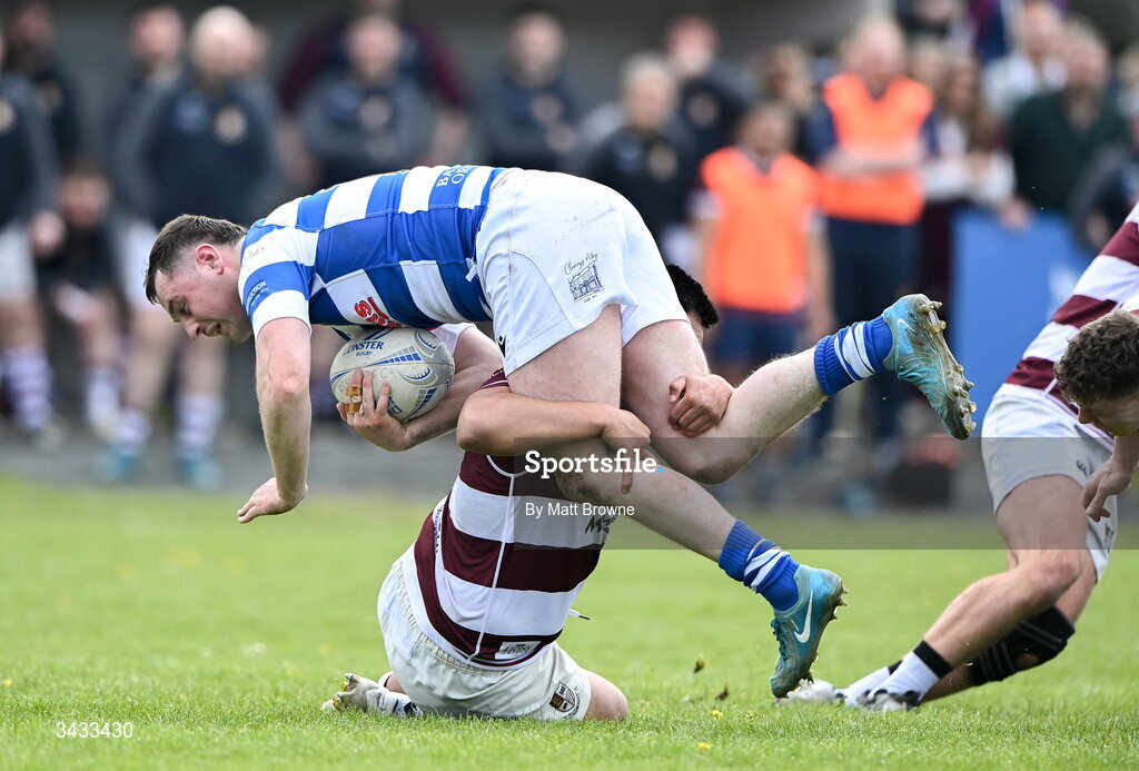 19 April 2026; Conan Dunne of Athy RFC is tackled by Ezri Vai of Tullow RFC during the Bank of Ireland Provincial Towns Cup Final match between Athy RFC and Tullow RFC at Edenderry RFC in Edenderry, Offaly. Photo by Matt Browne/Sportsfile