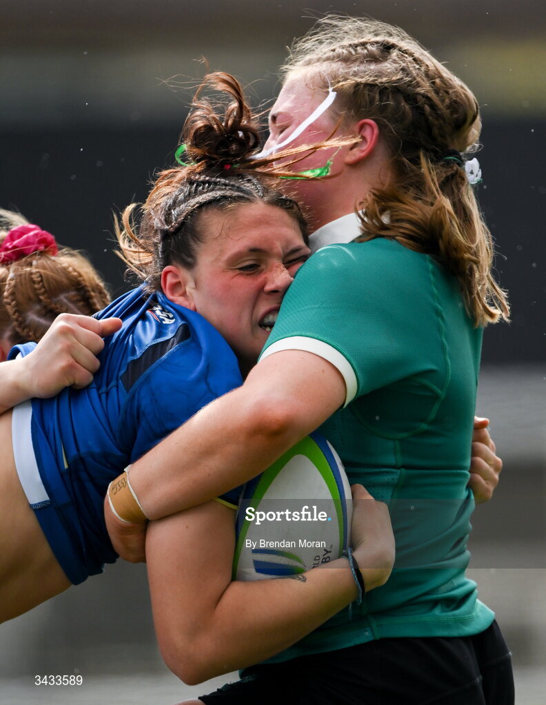 18 April 2026; Luce Florida of Italy is tackled by Ella Burns of Ireland during the Women's U21 Six Nations Series match between Ireland and Italy at Dexcom Stadium in Galway. Photo by Brendan Moran/Sportsfile