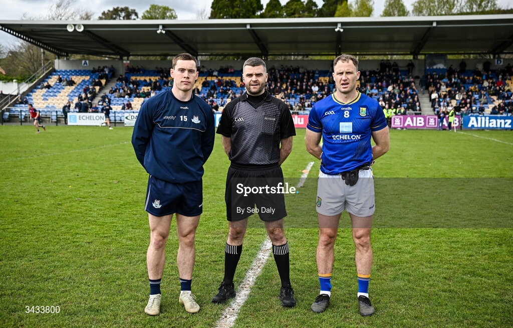 19 April 2026; Referee Conor Dourneen with Dublin captain Con O'Callaghan and Wicklow captain Dean Healy before the Leinster GAA Football Senior Championship quarter-final match between Wicklow and Dublin at Echelon Park in Aughrim in Wicklow. Photo by Seb Daly/Sportsfile