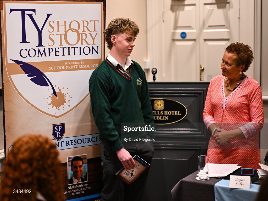 22 April 2026; National TY Short Story Competition finalist Darragh Redmond of Gorey Community College, Co Wexford, author of 'Colm's Storm', speaking with judge Regina Butler during the 3rd National TY Short Story Competition award ceremony at Buswells Hotel in Dublin. Photo by David Fitzgerald/Sportsfile