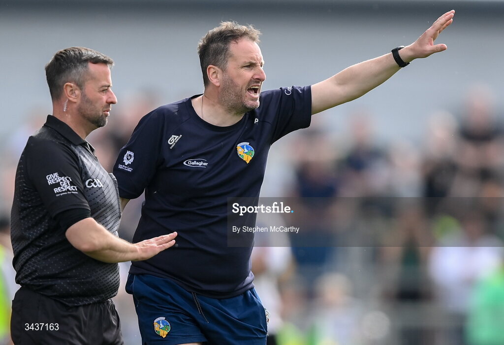 25 April 2026; Leitrim manager Steven Poacher and linesman David Gough during the Connacht GAA Football Senior Championship semi-final match between Leitrim and Galway at Heartland Credit Union Páirc Seán Mac Diarmada in Carrick-on-Shannon, Leitrim. Photo by Stephen McCarthy/Sportsfile