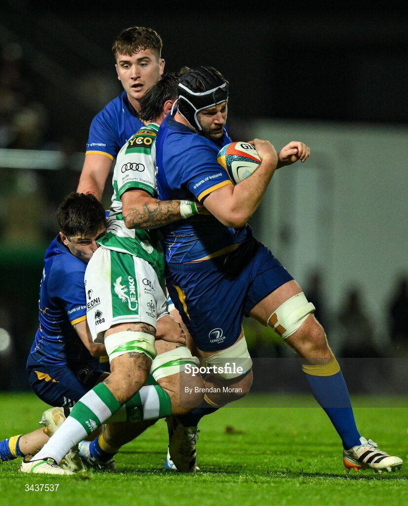 25 April 2026; Caelan Doris of Leinster is tackled by Riccardo Favretto of Benetton during the United Rugby Championship match between Benetton and Leinster at Stadio Monigo in Treviso, Italy. Photo by Brendan Moran/Sportsfile