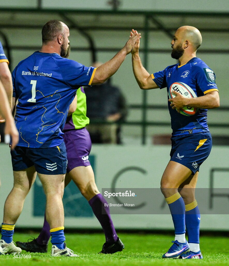 25 April 2026; Jamison Gibson-Park of Leinster, right, celebrates with teammate Ed Byrne, after scoring their side's third try during the United Rugby Championship match between Benetton and Leinster at Stadio Monigo in Treviso, Italy. Photo by Brendan Moran/Sportsfile