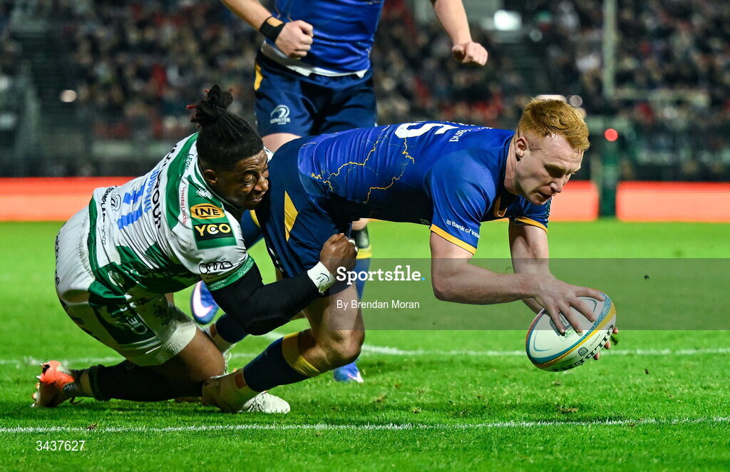 25 April 2026; Ciarán Frawley of Leinster scores his side's fourth try despite the tackle of Paolo Odogwu of Benetton during the United Rugby Championship match between Benetton and Leinster at Stadio Monigo in Treviso, Italy. Photo by Brendan Moran/Sportsfile