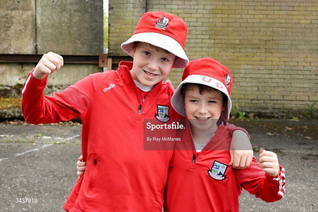 26 April 2026; Cork supporters Cathal, eleven years, and his brother Tadhg Browne, 9, from the Banteer GAA Club, on their way to the Munster GAA Senior Hurling Championship Round 2 match between Cork and Limerick at SuperValu Páirc Uí Chaoimh in Cork. Photo by Ray McManus/Sportsfile