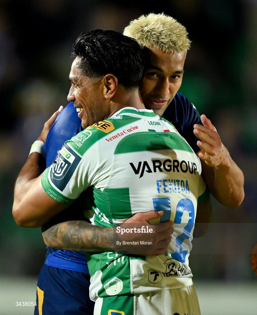 25 April 2026; Rieko Ioane of Leinster, right, and Malakai Fekitoa of Benetton meet after after the United Rugby Championship match between Benetton and Leinster at Stadio Monigo in Treviso, Italy. Photo by Brendan Moran/Sportsfile