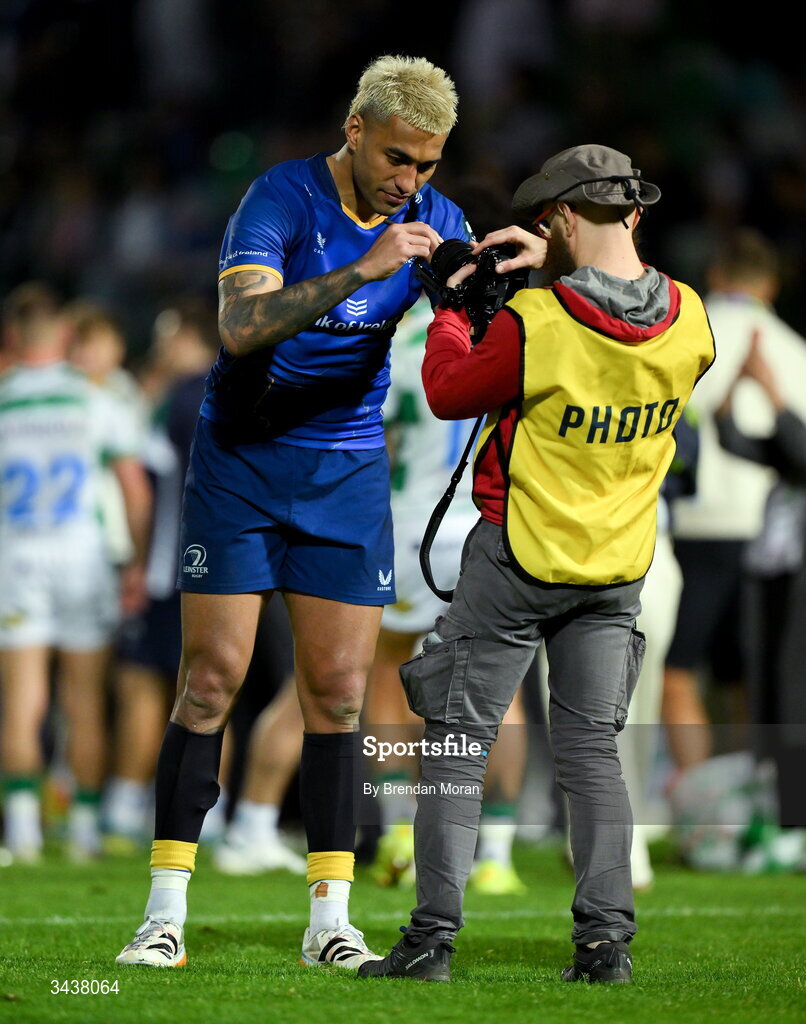 25 April 2026; Rieko Ioane of Leinster autographs a camera lens for a photographer after the United Rugby Championship match between Benetton and Leinster at Stadio Monigo in Treviso, Italy. Photo by Brendan Moran/Sportsfile