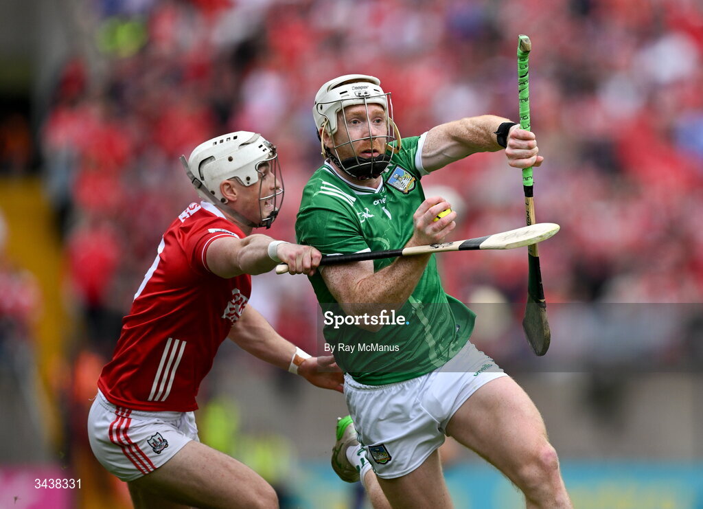 26 April 2026; Cian Lynch of Limerick is tackled by Tommy O'Connell of Cork during the Munster GAA Senior Hurling Championship Round 2 match between Cork and Limerick at SuperValu Páirc Uí Chaoimh in Cork. Photo by Ray McManus/Sportsfile