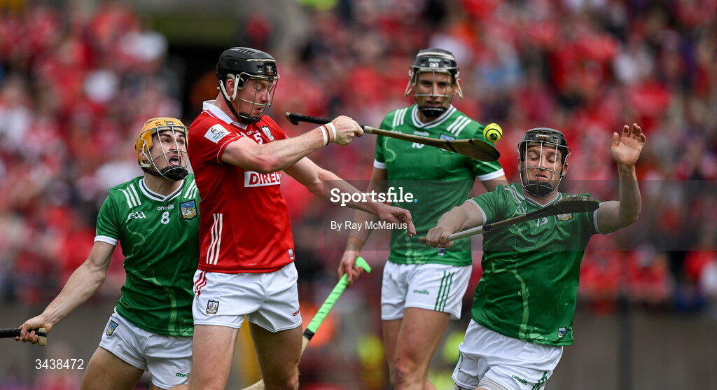 26 April 2026; Eoin Downey of Cork clears under pressure from Peter Casey of Limerick during the Munster GAA Senior Hurling Championship Round 2 match between Cork and Limerick at SuperValu Páirc Uí Chaoimh in Cork. Photo by Ray McManus/Sportsfile