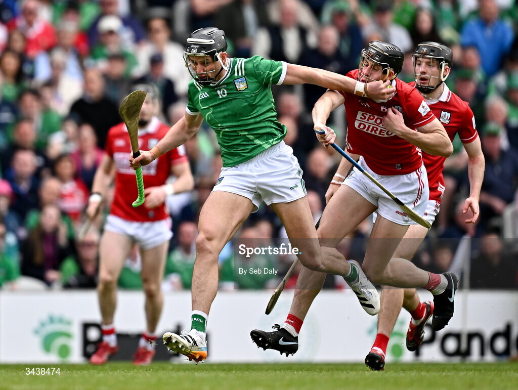 26 April 2026; Gearóid Hegarty of Limerick in action against Robert Downey of Cork during the Munster GAA Senior Hurling Championship Round 2 match between Cork and Limerick at SuperValu Páirc Uí Chaoimh in Cork. Photo by Seb Daly/Sportsfile