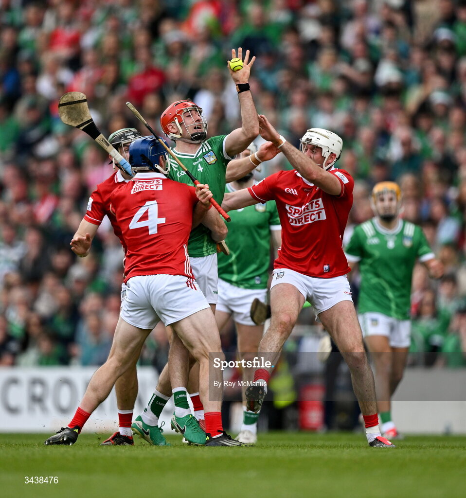 26 April 2026; Barry Nash of Limerick is tackled by Seán O'Donoghue, 4, and Tommy O'Connell of Cork during the Munster GAA Senior Hurling Championship Round 2 match between Cork and Limerick at SuperValu Páirc Uí Chaoimh in Cork. Photo by Ray McManus/Sportsfile