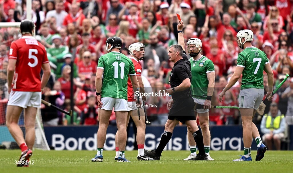 26 April 2026; Cian Lynch of Limerick, second from right, is shown a red card by referee James Owens during the Munster GAA Senior Hurling Championship Round 2 match between Cork and Limerick at SuperValu Páirc Uí Chaoimh in Cork. Photo by Seb Daly/Sportsfile