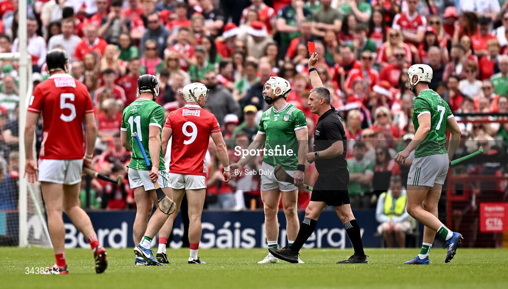 26 April 2026; Cian Lynch of Limerick, centre, is shown a red card by referee James Owens during the Munster GAA Senior Hurling Championship Round 2 match between Cork and Limerick at SuperValu Páirc Uí Chaoimh in Cork. Photo by Seb Daly/Sportsfile