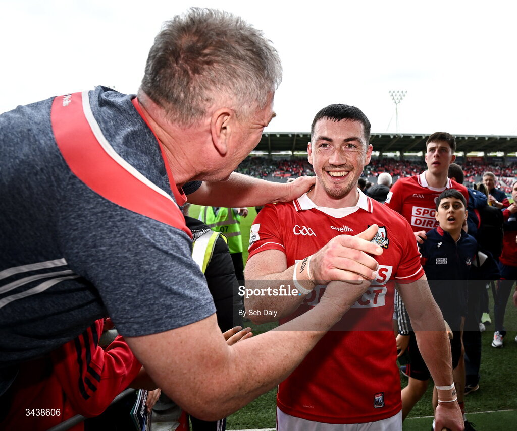 26 April 2026; Seán O'Donoghue of Cork celebrates with a supporter after his side's victory in the Munster GAA Senior Hurling Championship Round 2 match between Cork and Limerick at SuperValu Páirc Uí Chaoimh in Cork. Photo by Seb Daly/Sportsfile
