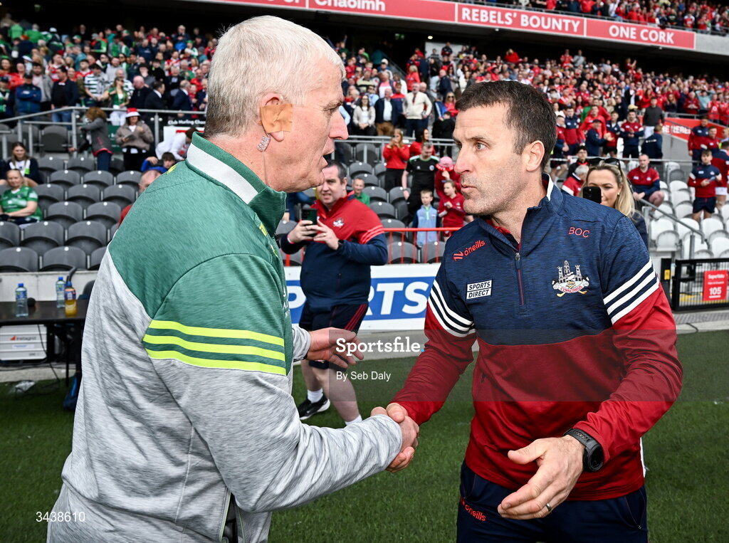 26 April 2026; Cork manager Ben O'Connor, right, and Limerick manager John Kiely shake hands after the Munster GAA Senior Hurling Championship Round 2 match between Cork and Limerick at SuperValu Páirc Uí Chaoimh in Cork. Photo by Seb Daly/Sportsfile