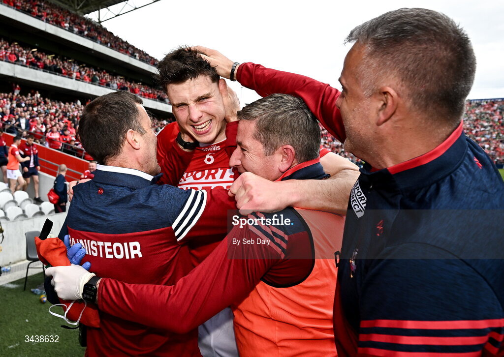 26 April 2026; Cork's Robert Downey, second from left, celebrates with manager Ben O'Connor, left, and backroom staff members after their side's victory in the Munster GAA Senior Hurling Championship Round 2 match between Cork and Limerick at SuperValu Páirc Uí Chaoimh in Cork. Photo by Seb Daly/Sportsfile