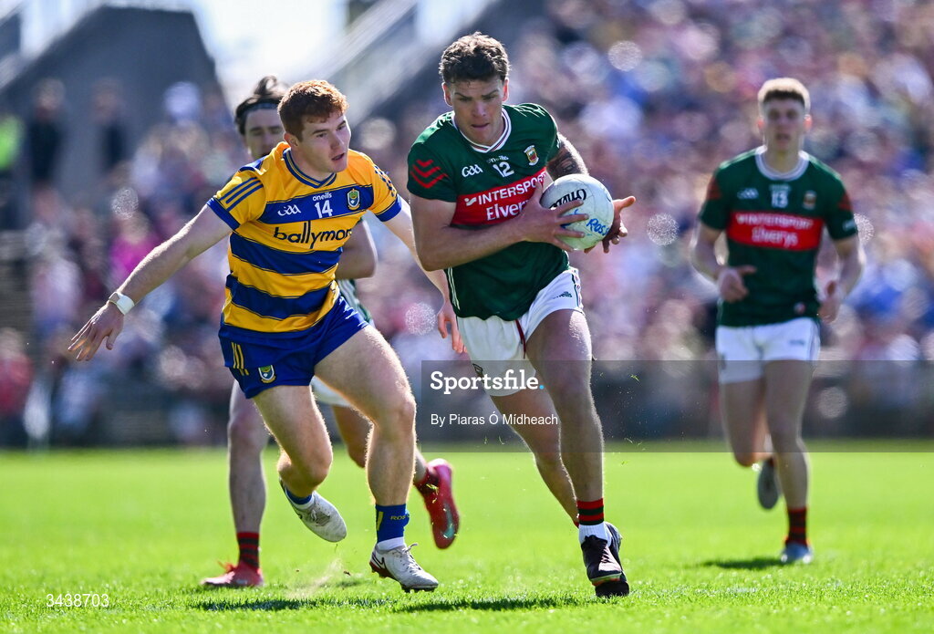 26 April 2026; Jordan Flynn of Mayo in action against Colm Neary of Roscommon during the Connacht GAA Football Senior Championship semi-final match between Mayo and Roscommon at Hastings Insurance MacHale Park in Castlebar, Mayo. Photo by Piaras Ó Mídheach/Sportsfile