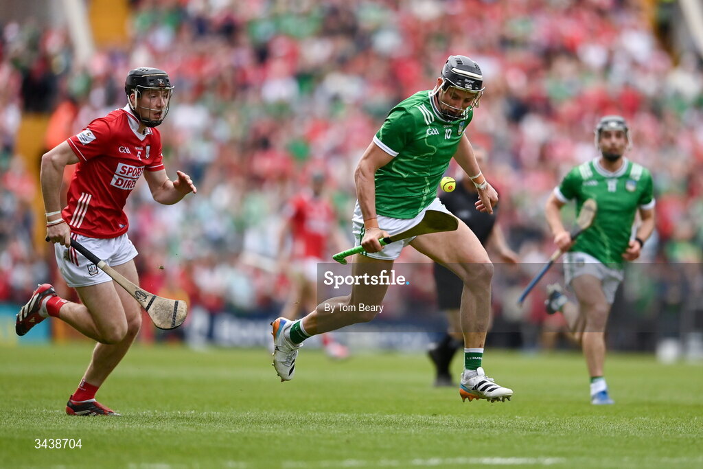 26 April 2026; Gearóid Hegarty of Limerick races clear of Eoin Downey of Cork during the Munster GAA Senior Hurling Championship Round 2 match between Cork and Limerick at SuperValu Páirc Uí Chaoimh in Cork. Photo by Tom Beary/Sportsfile