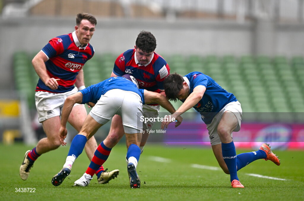 26 April 2026; Aaron Coleman of Clontarf FC is tackled by Ramirez Leandro, left, and Robert Gilsenan of St Mary's College RFC during the Energia Men's All-Ireland League Division 1A final match between Clontarf FC and St Mary's College RFC at the Aviva Stadium in Dublin. Photo by Tyler Miller/Sportsfile