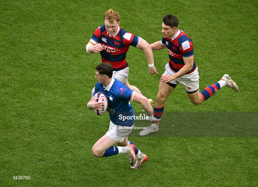26 April 2026; Ruairi Shields of St Mary's College RFC in action against Hugh Cooney, left, and Dylan O’Grady of Clontarf FC during the Energia Men's All-Ireland League Division 1A final match between Clontarf FC and St Mary's College RFC at the Aviva Stadium in Dublin. Photo by Daire Brennan/Sportsfile