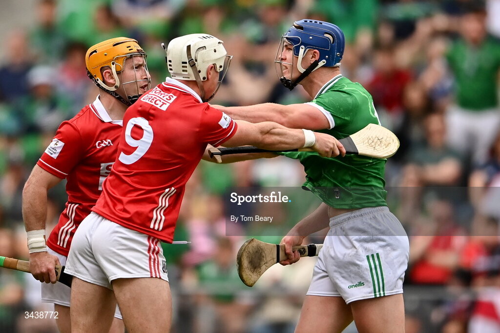 26 April 2026; Shane O'Brien of Limerick tussles with Niall O'Leary, left and Tommy O'Connell of Cork during the Munster GAA Senior Hurling Championship Round 2 match between Cork and Limerick at SuperValu Páirc Uí Chaoimh in Cork. Photo by Tom Beary/Sportsfile