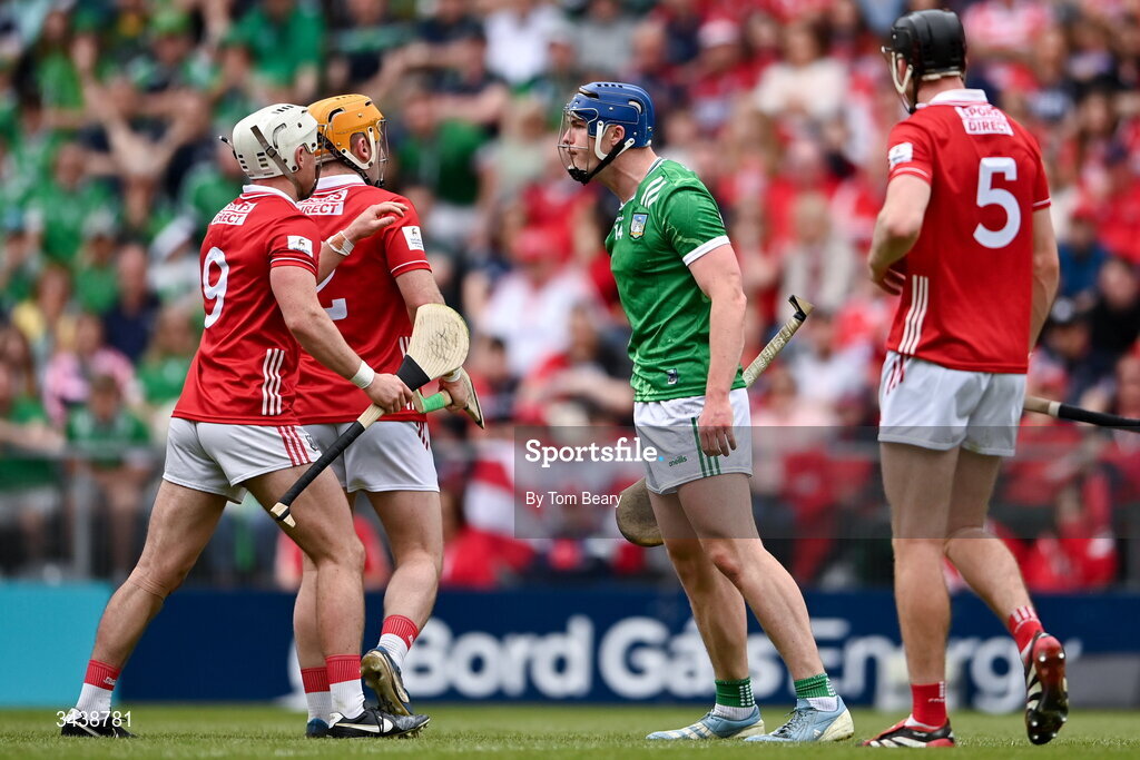 26 April 2026; Shane O'Brien of Limerick tussles with Niall O'Leary, left and Tommy O'Connell of Cork during the Munster GAA Senior Hurling Championship Round 2 match between Cork and Limerick at SuperValu Páirc Uí Chaoimh in Cork. Photo by Tom Beary/Sportsfile