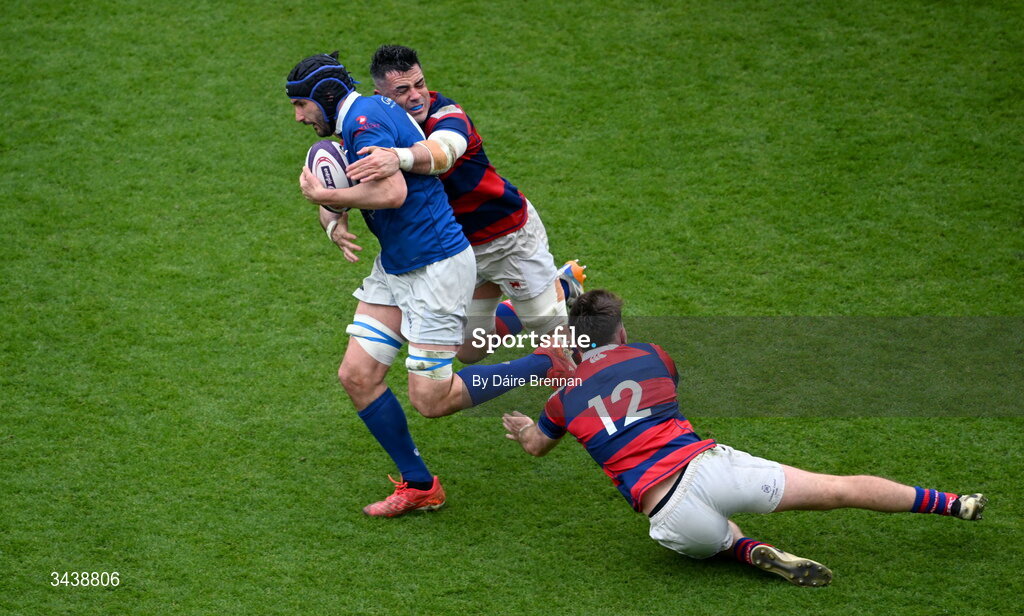 26 April 2026; Greg Jones of St Mary's College RFC is tackled by Jordan Coghlan, left, and Daniel Hawkshaw of Clontarf FC during the Energia Men's All-Ireland League Division 1A final match between Clontarf FC and St Mary's College RFC at the Aviva Stadium in Dublin. Photo by Daire Brennan/Sportsfile