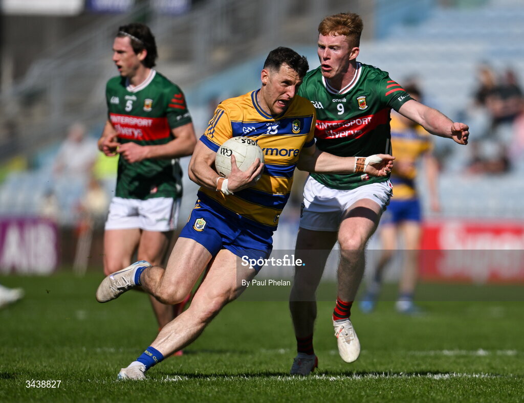 26 April 2026; Diarmuid Murtagh  of Roscommon in action against David McBrien of Mayo during the Connacht GAA Football Senior Championship semi-final match between Mayo and Roscommon at Hastings Insurance MacHale Park in Castlebar, Mayo. Photo by Paul Phelan/Sportsfile