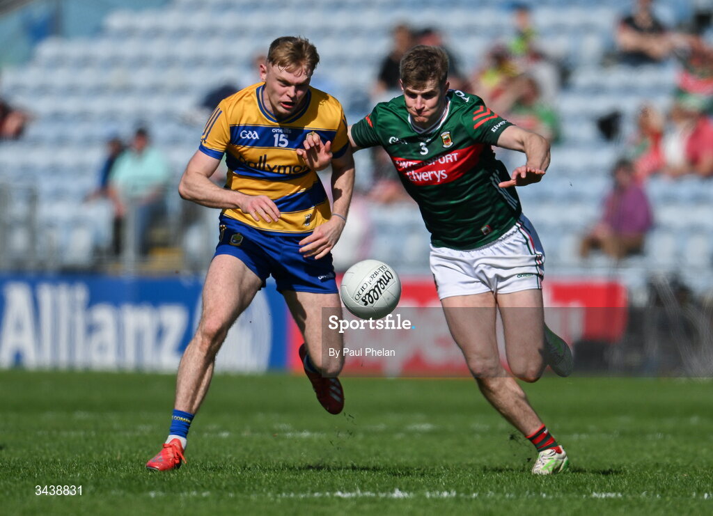 26 April 2026; Robert Heneghan  of Roscommon in action against Rory Brickenden of Mayo during the Connacht GAA Football Senior Championship semi-final match between Mayo and Roscommon at Hastings Insurance MacHale Park in Castlebar, Mayo. Photo by Paul Phelan/Sportsfile