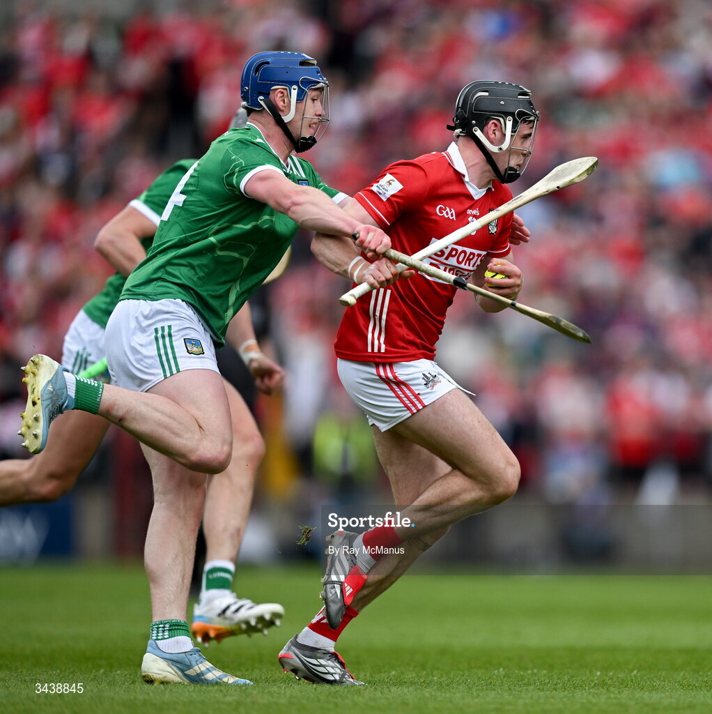 26 April 2026; Darragh Fitzgibbon of Cork is tackled by Aidan O'Connor of Limerick during the Munster GAA Senior Hurling Championship Round 2 match between Cork and Limerick at SuperValu Páirc Uí Chaoimh in Cork. Photo by Ray McManus/Sportsfile