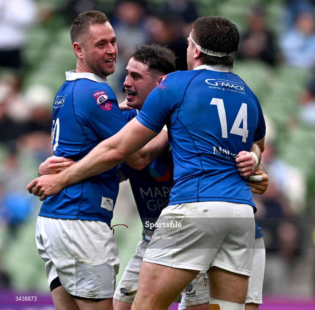 26 April 2026; Ruairi Shields of St Mary's College RFC, centre, celebrates with teammates Conor Dean, left, and Aaron O'Sullivan after scoring their side's fourth try during the Energia Men's All-Ireland League Division 1A final match between Clontarf FC and St Mary's College RFC at the Aviva Stadium in Dublin. Photo by Tyler Miller/Sportsfile