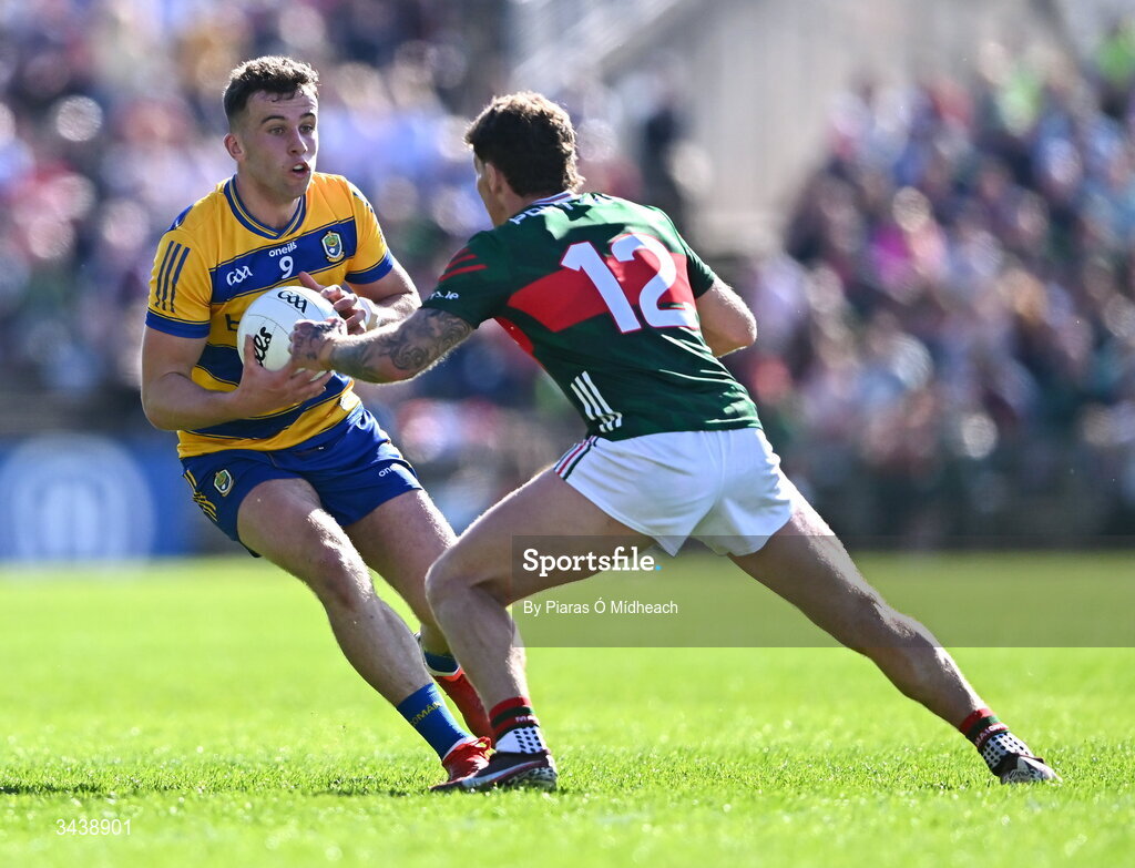 26 April 2026; Conor Ryan of Roscommon in action against Jordan Flynn of Mayo during the Connacht GAA Football Senior Championship semi-final match between Mayo and Roscommon at Hastings Insurance MacHale Park in Castlebar, Mayo. Photo by Piaras Ó Mídheach/Sportsfile