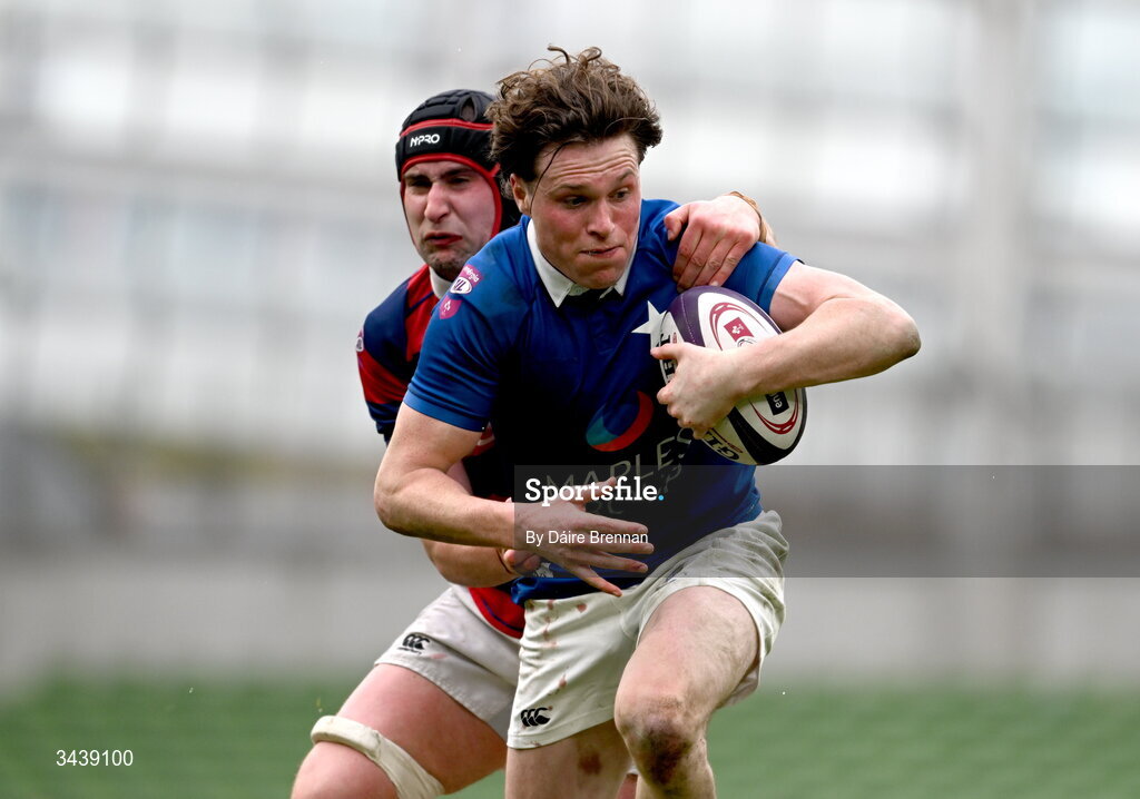 26 April 2026; Myles Carey of St Mary's College RFC is tackled by Fionn Gilbert of Clontarf FC during the Energia Men's All-Ireland League Division 1A final match between Clontarf FC and St Mary's College RFC at the Aviva Stadium in Dublin. Photo by Daire Brennan/Sportsfile