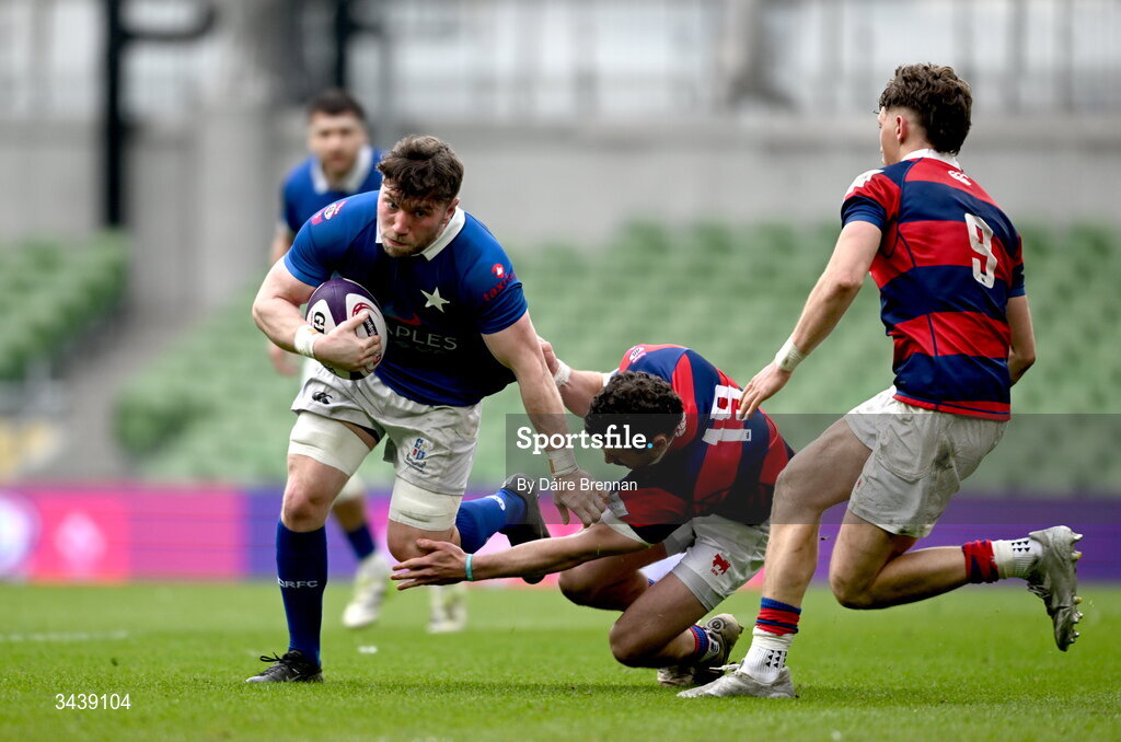 26 April 2026; Finn Burke of St Mary's College RFC is tackled by Michael Moloney of Clontarf FC during the Energia Men's All-Ireland League Division 1A final match between Clontarf FC and St Mary's College RFC at the Aviva Stadium in Dublin. Photo by Daire Brennan/Sportsfile