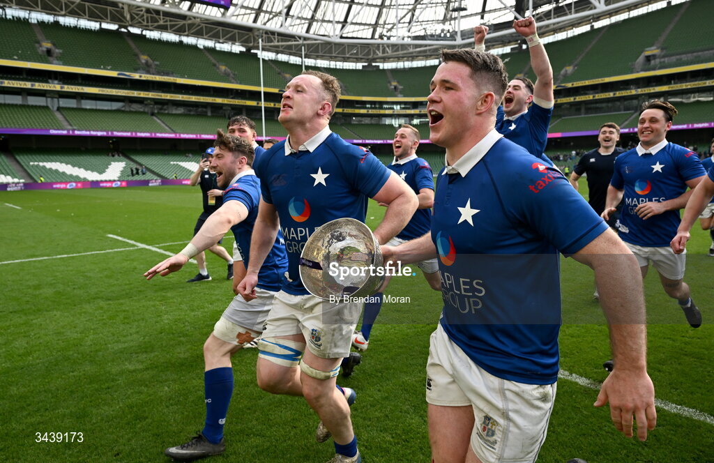 26 April 2026; Ronan Watters, left, and Mick O'Gara of St Mary's College RFC celebrate with the trophy after the Energia Men's All-Ireland League Division 1A final match between Clontarf FC and St Mary's College RFC at the Aviva Stadium in Dublin. Photo by Brendan Moran/Sportsfile