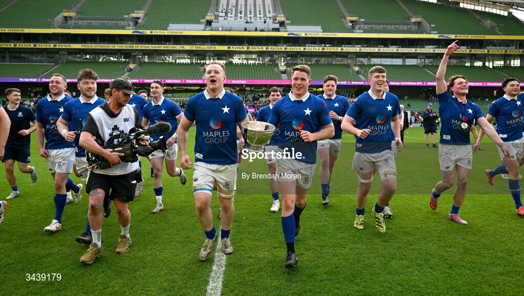 26 April 2026; Ronan Watters, left, and Mick O'Gara of St Mary's College RFC celebrate with the trophy after the Energia Men's All-Ireland League Division 1A final match between Clontarf FC and St Mary's College RFC at the Aviva Stadium in Dublin. Photo by Brendan Moran/Sportsfile