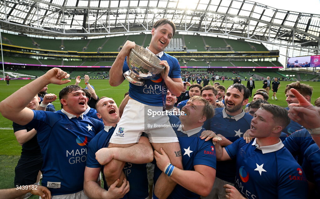 26 April 2026; Mark Fogarty of St Mary's College RFC is held aloft by teammates as they celebrate with the trophy after the Energia Men's All-Ireland League Division 1A final match between Clontarf FC and St Mary's College RFC at the Aviva Stadium in Dublin. Photo by Brendan Moran/Sportsfile
