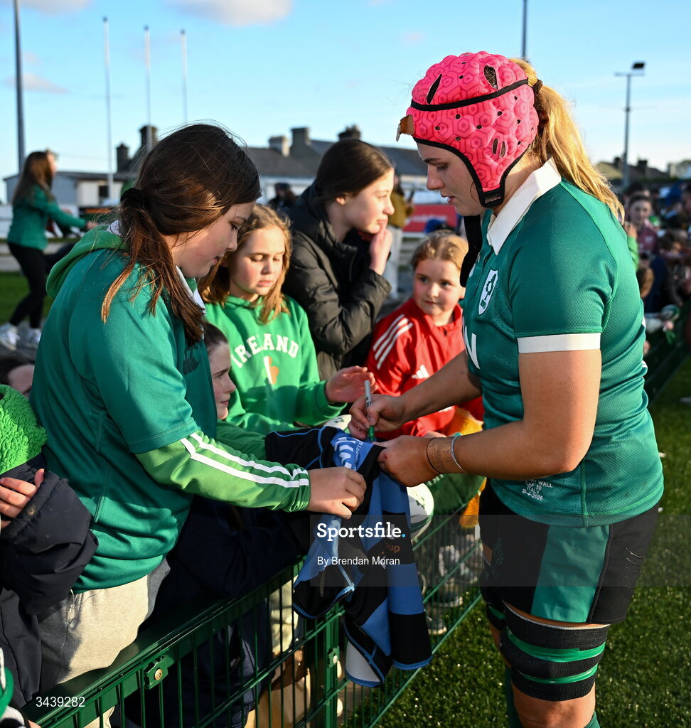 18 April 2026; Dorothy Wall of Ireland signs autographs after the Women's Six Nations Rugby Championship match between Ireland and Italy at Dexcom Stadium in Galway. Photo by Brendan Moran/Sportsfile