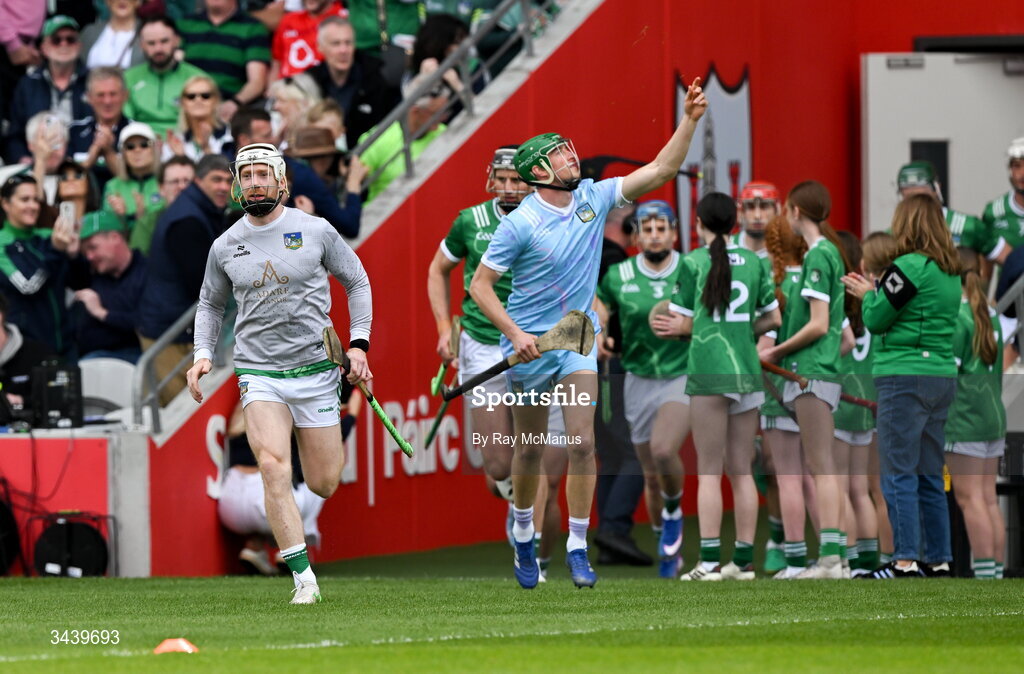 26 April 2026; Limerick captain, Cian Lynch, left, leads out his players before the Munster GAA Senior Hurling Championship Round 2 match between Cork and Limerick at SuperValu Páirc Uí Chaoimh in Cork. Photo by Ray McManus/Sportsfile