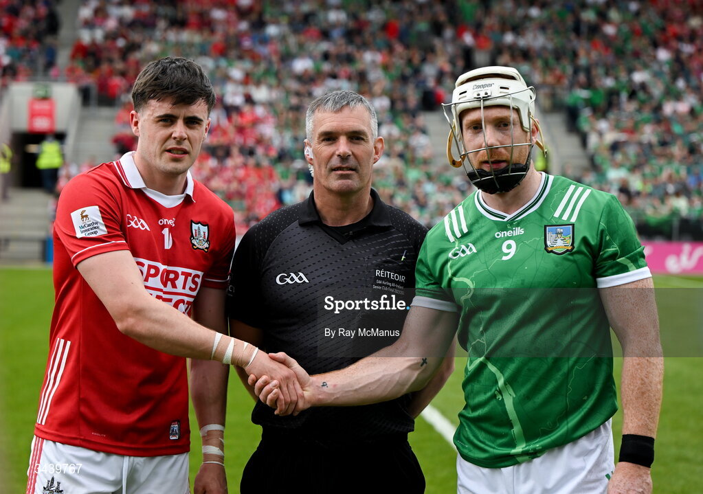 26 April 2026; Referee James Owens with the two captains, Darragh Fitzgibbon of Cork and Cian Lynch of Limerick, before  the Munster GAA Senior Hurling Championship Round 2 match between Cork and Limerick at SuperValu Páirc Uí Chaoimh in Cork. Photo by Ray McManus/Sportsfile