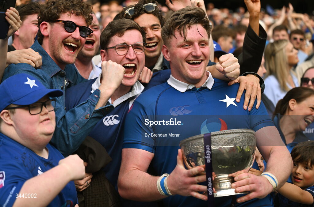 26 April 2026; Michael McCormack of St Mary's College RFC celebrates with friends and the cup after the Energia Men's All-Ireland League Division 1A final match between Clontarf FC and St Mary's College RFC at the Aviva Stadium in Dublin. Photo by Brendan Moran/Sportsfile