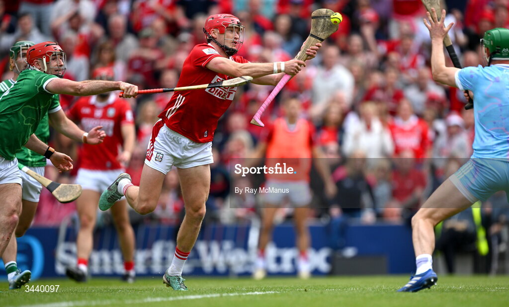 26 April 2026; Alan Connolly of Cork shoots past Limerick goalkeeper Nickie Quaid to score a goal despite the presence of Barry Nash of Limerick during the Munster GAA Senior Hurling Championship Round 2 match between Cork and Limerick at SuperValu Páirc Uí Chaoimh in Cork. Photo by Ray McManus/Sportsfile