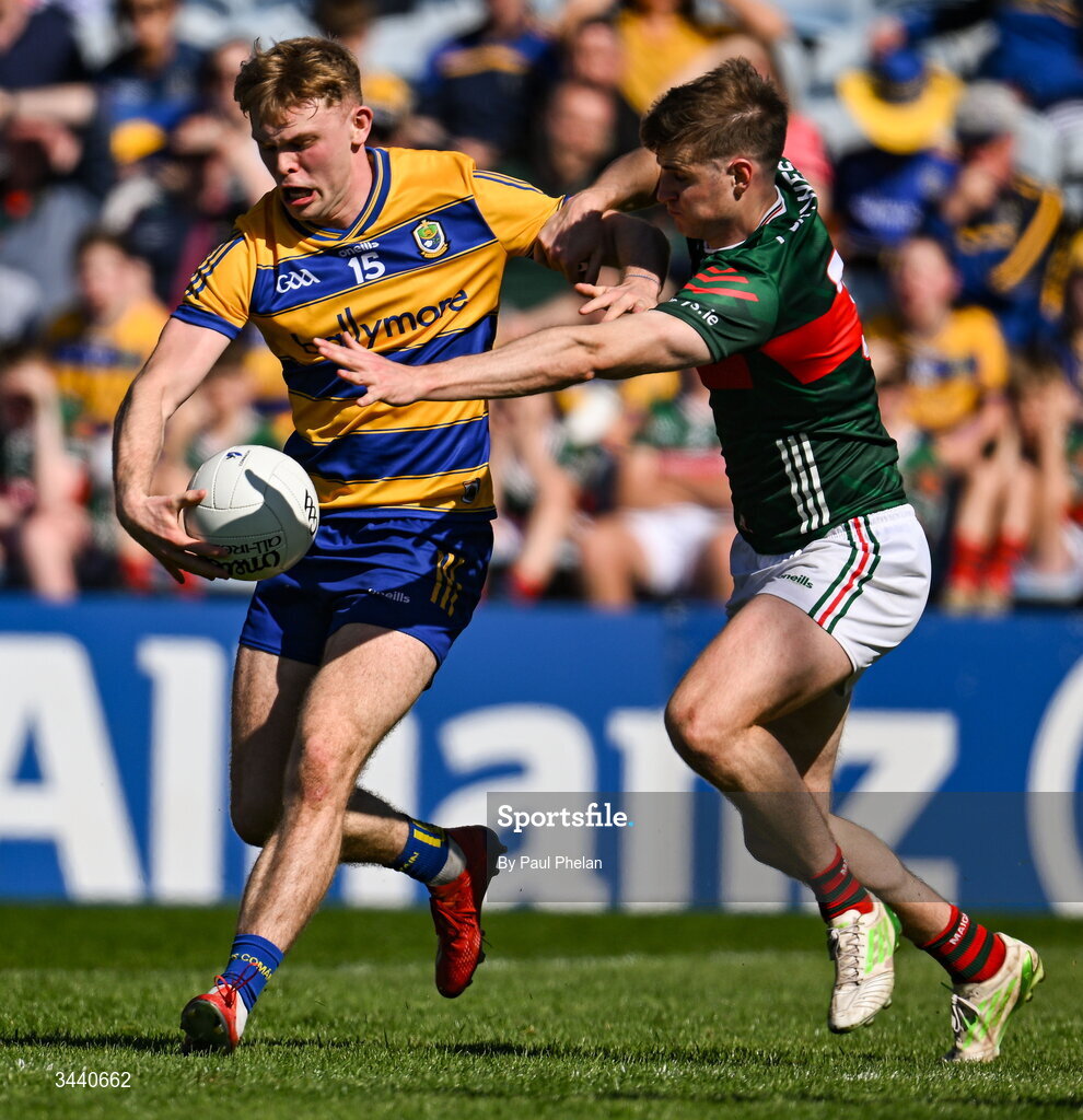 26 April 2026; Robert Heneghan of Roscommon in action against Rory Brickenden of Mayo during the Connacht GAA Football Senior Championship semi-final match between Mayo and Roscommon at Hastings Insurance MacHale Park in Castlebar, Mayo. Photo by Paul Phelan/Sportsfile