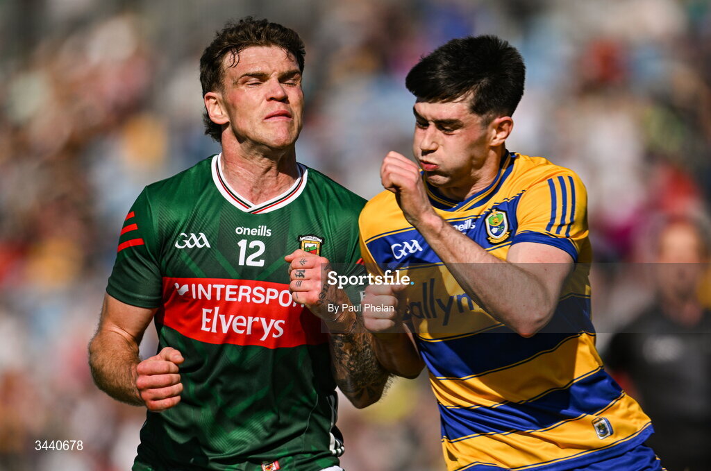 26 April 2026; Jordan Flynn of Mayo collides with Senan Lambe of Roscommon during the Connacht GAA Football Senior Championship semi-final match between Mayo and Roscommon at Hastings Insurance MacHale Park in Castlebar, Mayo. Photo by Paul Phelan/Sportsfile